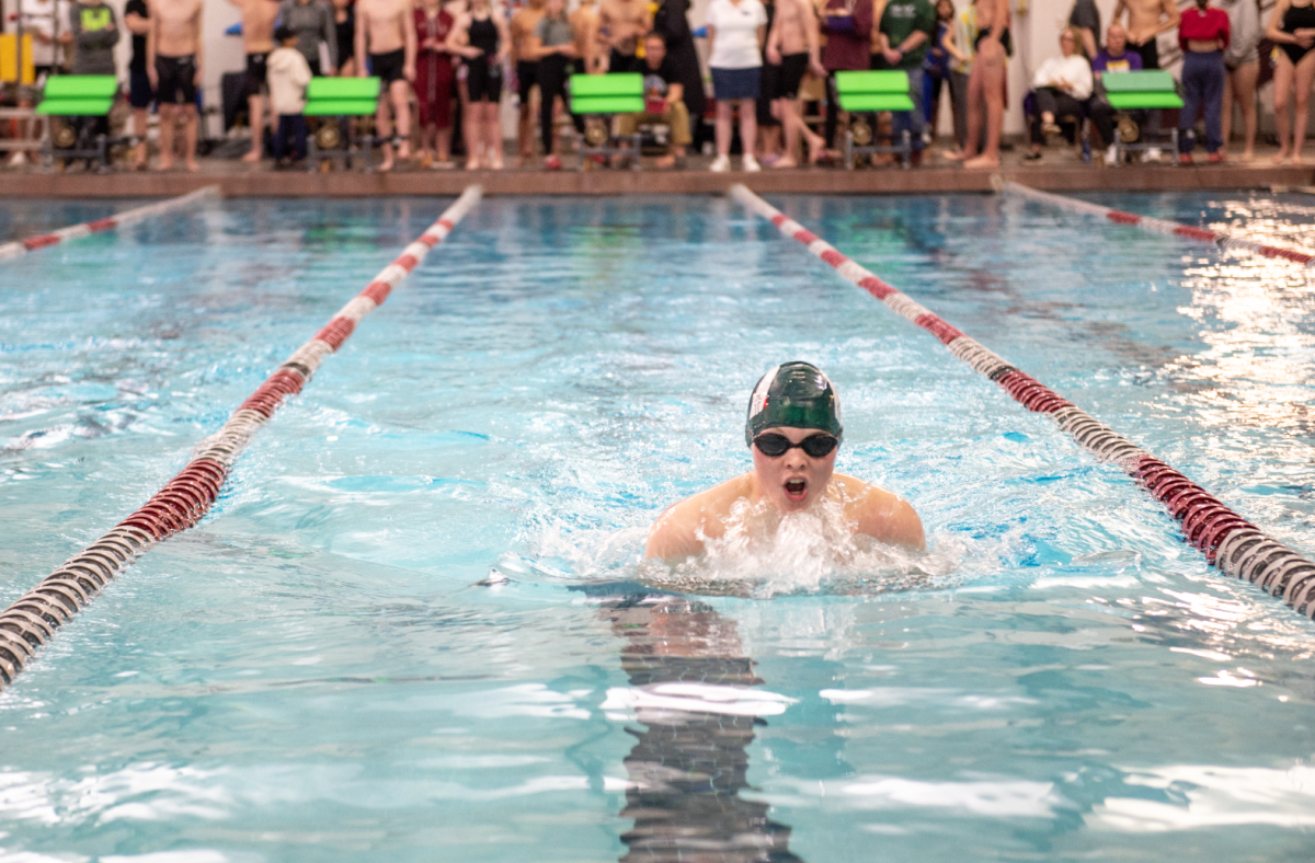 2.1.25 Senior Will Zink swimming breaststroke in the 200 IM at Missoula. 